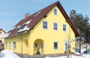 Bau von Wohnhaus mit Arztpraxis, Tiefbau, Rohbau und Außenanlage